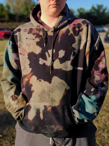 An image of a galaxy patterned hoodie